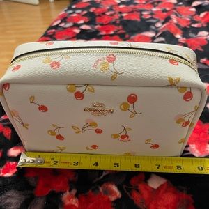 Authentic Coach Cherry boxy cosmetic bag.NWT.